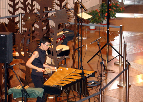 Percussionist gives a foyer performance at the New Vision Arts Festival 2004.