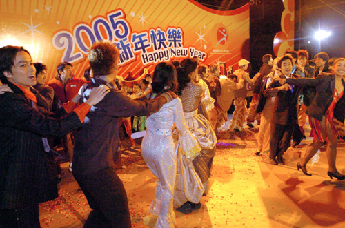 Revellers at the New Year's Eve Countdown Carnival at Sha Tin Park and Sha Tin Town Hall.