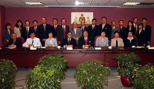 Members of the 2009 East Asia Games Planning Committee after their first meeting in July.