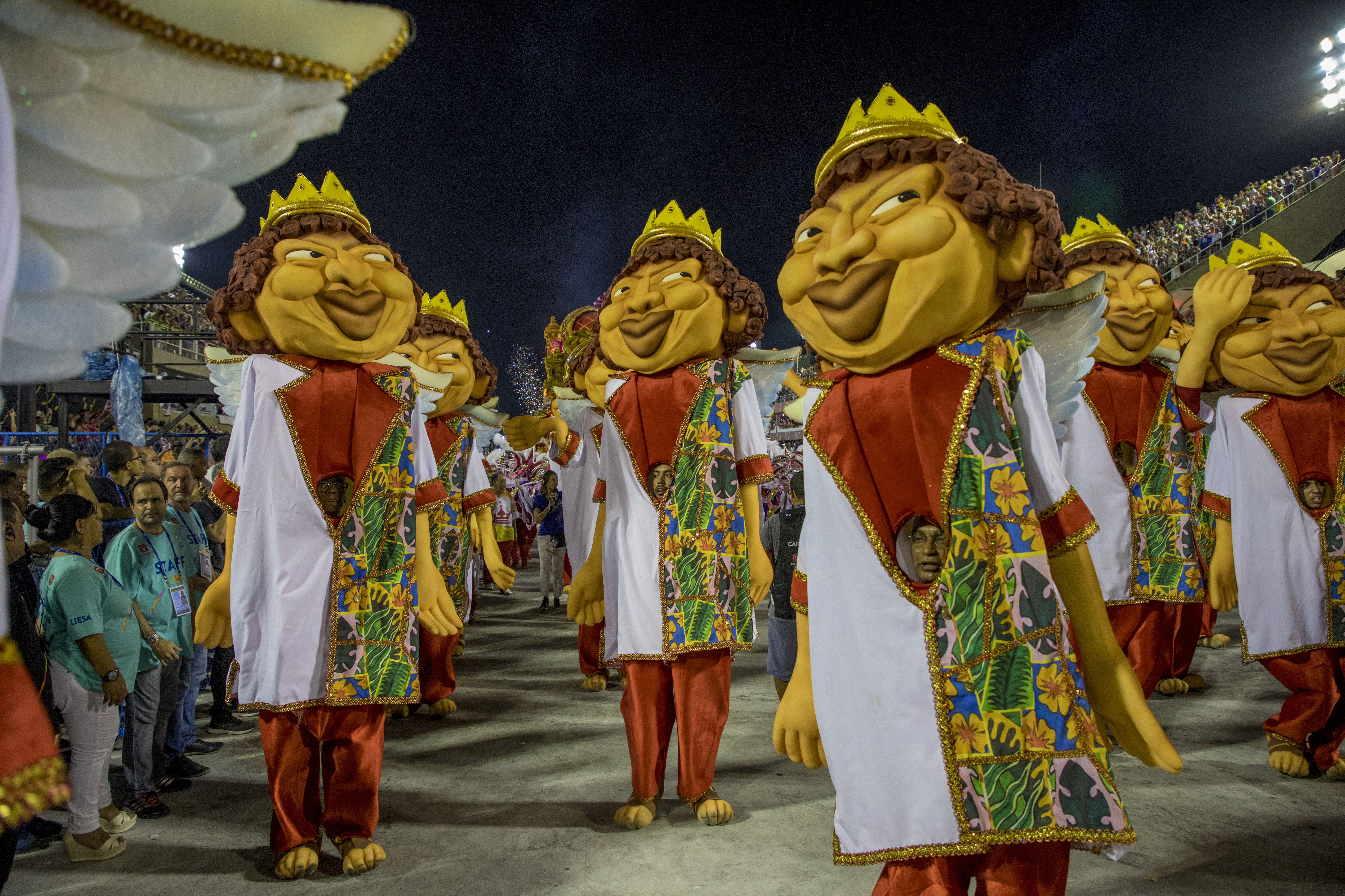 Elaborately costumed dancers performing at Carnival Samba