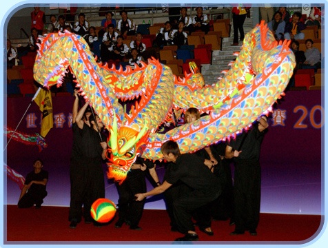 The lively luminous dragon dance lights the way through the Hong Kong Coliseum.