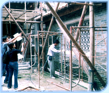 Staff of the Antiquities and Monuments Office oversee the restoration and repair work of the Hau Mei Fung ancestral hall in Sheung Shui.