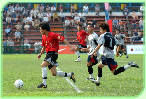 Football players show their skills at the inter-district competition.