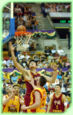 Basketball superstar Yao Ming playing against the Melbourne Tigers at the International Basketball Challenge 2003.