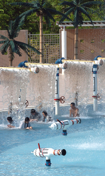 Cooling off at the Tseung Kwan O Swimming Pool, one of the many pools managed by the LCSD.
