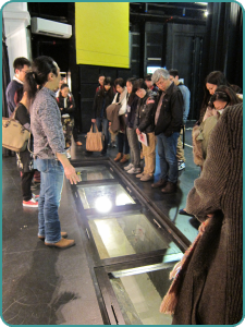 Staff learn about the carpet storage lift in the Yau Ma Tei Theatre, as part of the Chat Room Series.