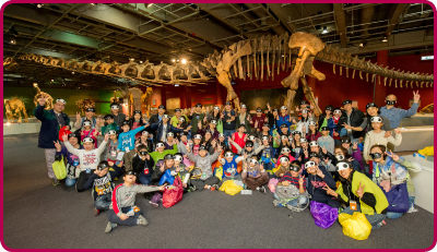 Participants having a good time during A Night with Dinosaurs, a family programme organised by the Hong Kong Science Museum in connection with the Legends of the Giant Dinosaurs exhibition.