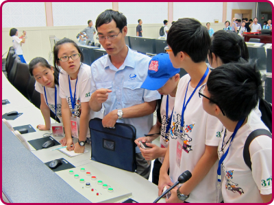 Students visiting the Command and Control Room at the Jiuquan Satellite Launch Center.