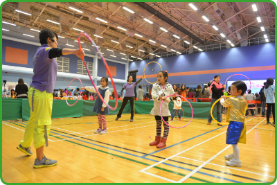 Children and adults alike enjoy exercising with hula hoops.