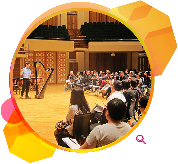 Staff from different performing arts venues in a talk on the proper handling of musical instruments.