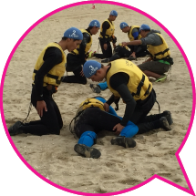 Swimming pool trainees practising cardio-pulmonary resuscitation during a training course at Golden Beach.