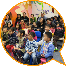 Children and parents experience the joys of reading at an interactive storytelling workshop.
