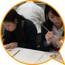 Students making photo frames in a conservation workshop held under the School Culture Day Scheme.