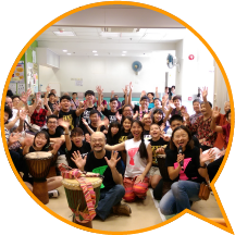 Participants cheering at James Kwan's African drum touring performance under the Community Cultural Ambassador Scheme. 