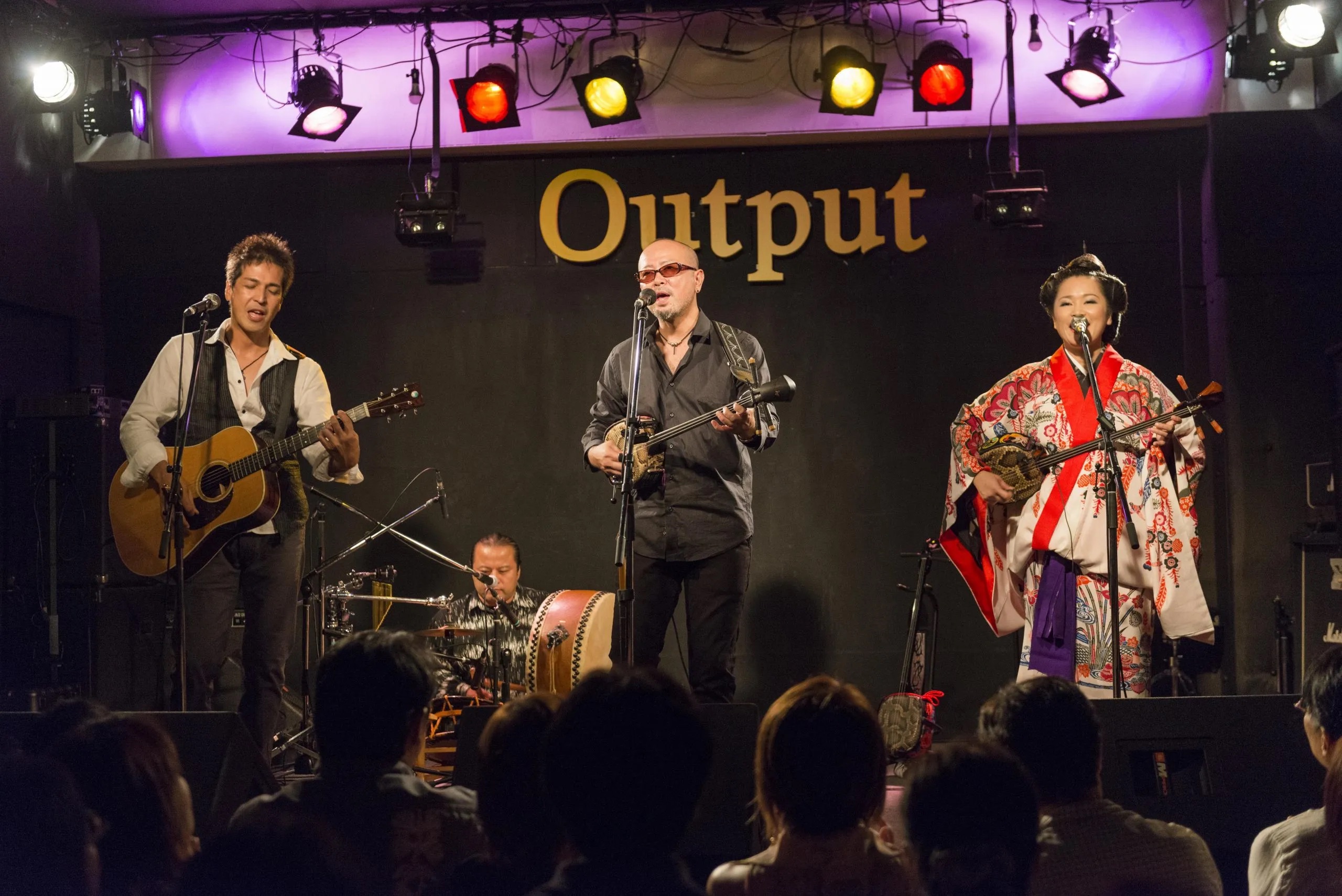 Okinawan folk singers performing the sanshin in collaboration with other instrumentalists at the Music From Japan Festival 2014